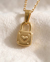 Little by Little Lock pendant close up, debossed heart and dots