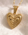 Heart on Your Sleeve pendant close up on paperclip chain