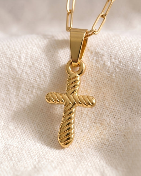 Quiet Devotion Cross pendant close up on paperclip chain