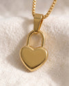 Love Language Lock pendant close-up on gold box-link chain