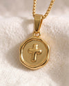 Blessed Beyond Belief Cross pendant close-up on gold box-link chain
