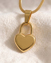 Love Language Lock pendant close-up on gold snake chain